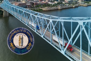 Kentucky Weight Distance Permit KYU Permit Kentucky Weight Distance Tax semi trucks crossing a Kentucky bridge
